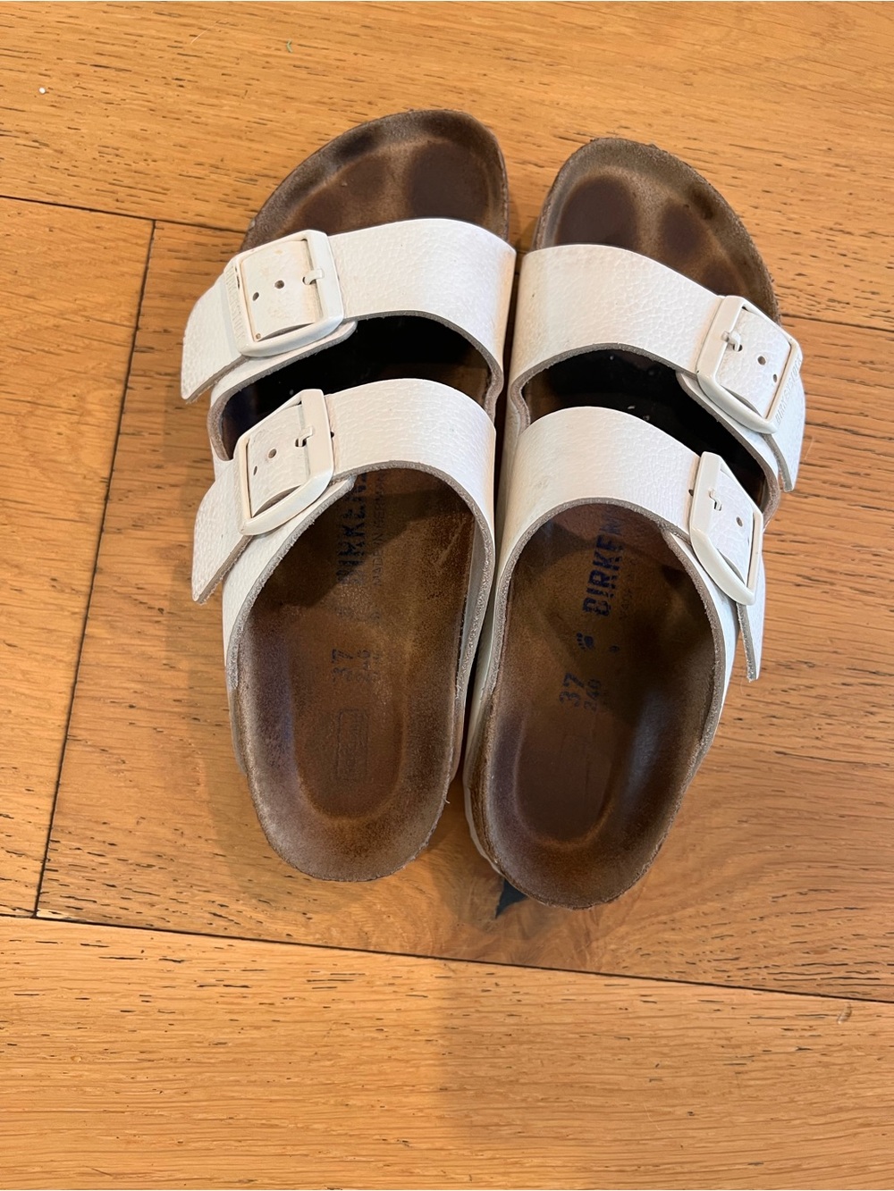 Old Used White Birkenstock Sandals